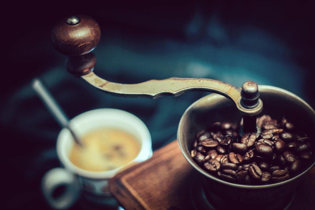 decaf cold brew coffee beans being grinded